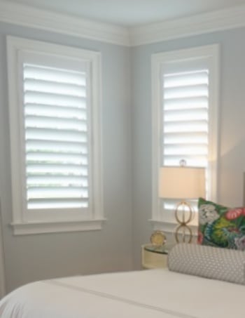 White plantation shutters with hidden tilt rods in Raleigh